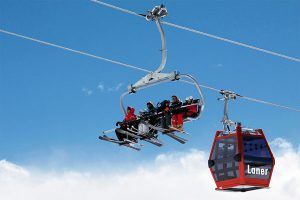 Die Telemix Sessel-Kabinenbahn "Laner" in Obereggen ersetzt den fixen 4er-Sessellift. Die neue Bahn wird 6er-Sessel und 8er-Kabinen haben und wird auch die neue, 750 m lange Rodelbahn bedienen. - Foto: Dolomiti Superski