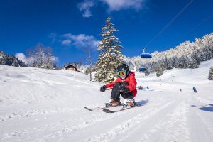 Von wegen Füße in den Bauch stehen! Mit dem neuen Lift verkürzen sich die Wartezeiten deutlich. - Foto: Tourismus Lenggries / Adrian Greiter